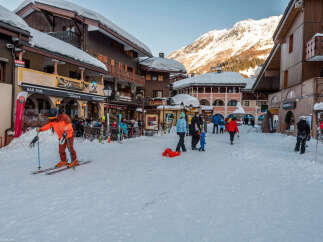 Experience the charm of a winter wonderland in this picturesque ski resort town.