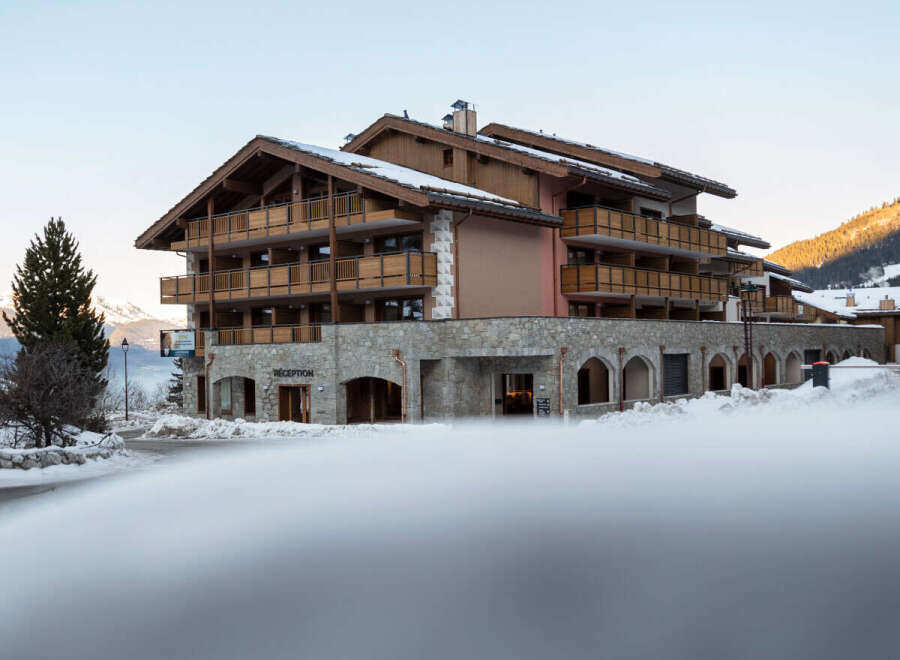 This stunning property showcases a blend of rustic charm and modern elegance, perfect for a luxurious mountain getaway.