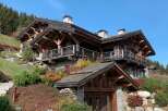 This stunning chalet boasts exquisite craftsmanship, with exposed wooden beams and stonework creating a warm and inviting atmosphere.