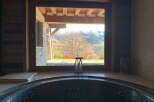 Luxury chalet with stunning mountain views and a private hot tub.