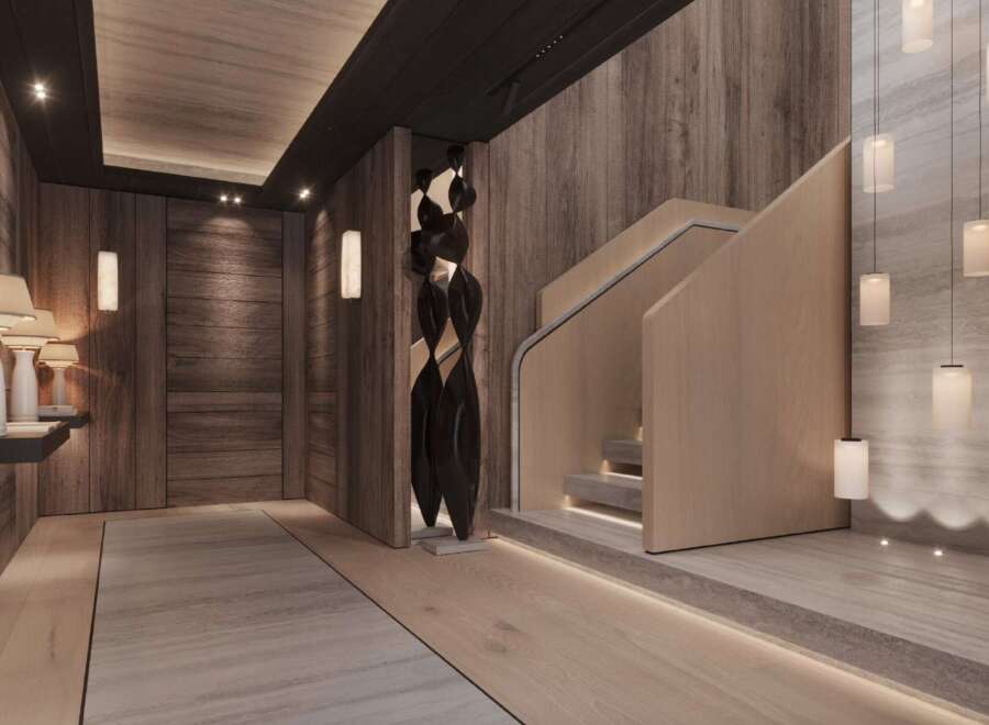 This stunning property boasts a grand entrance with a sleek, modern design.