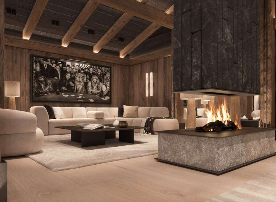 This luxurious chalet boasts a stunning centerpiece: a large, modern fireplace with a rustic stone surround, creating a warm and inviting atmosphere.