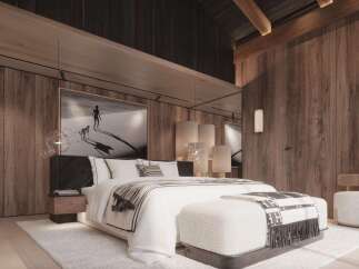 Luxurious mountain retreat with stunning wood-paneled walls and a cozy, comfortable bedroom.