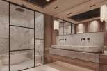 Luxurious bathroom with marble finishes and wooden accents.