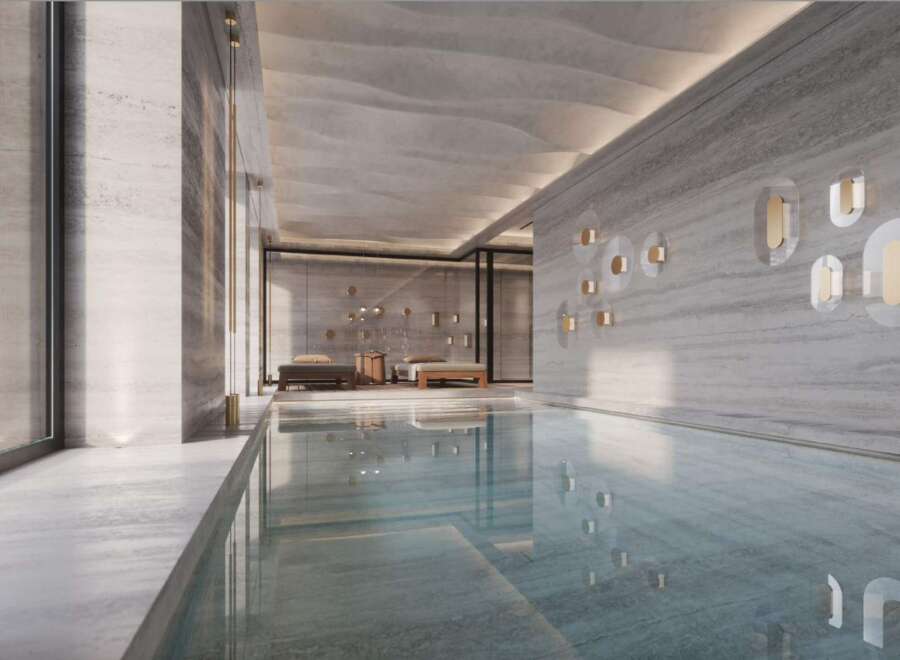 Indulge in luxury with this stunning indoor pool, featuring sleek design and serene ambiance.