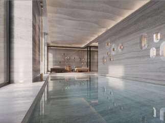 Indulge in luxury with this stunning indoor pool, featuring sleek design and serene ambiance.