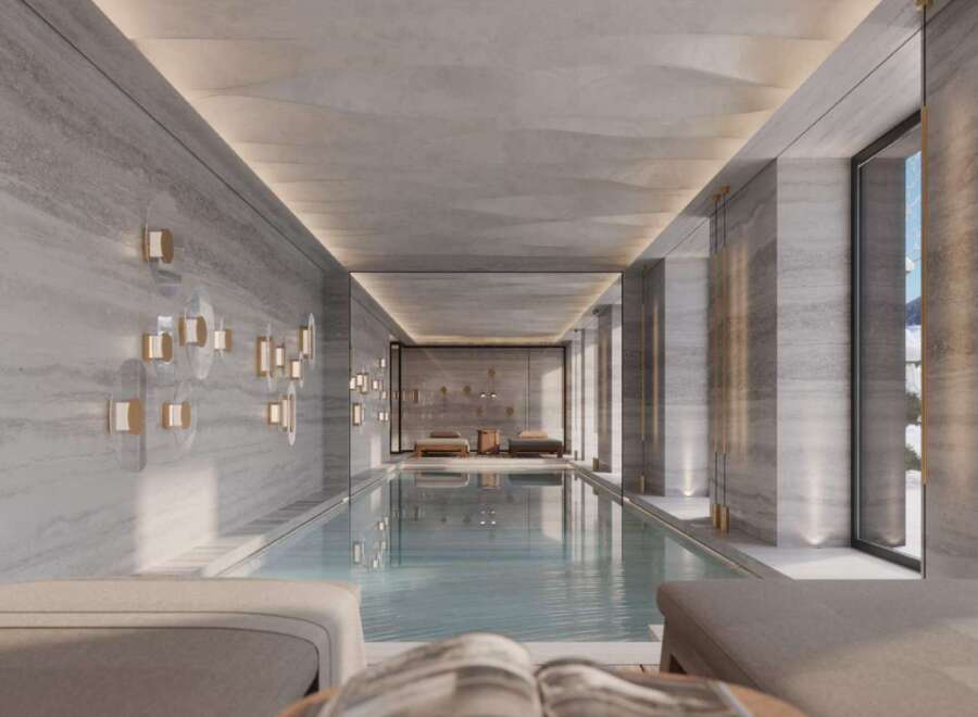 Indulge in the serene atmosphere of this luxurious indoor pool, perfect for relaxation and rejuvenation.