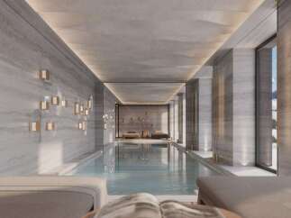 Indulge in the serene atmosphere of this luxurious indoor pool, perfect for relaxation and rejuvenation.