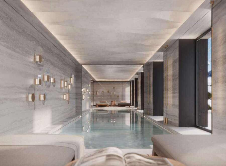 Indulge in the ultimate luxury with this stunning indoor pool, featuring sleek design and serene ambiance.