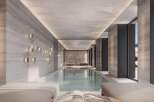 Indulge in the ultimate luxury with this stunning indoor pool, featuring sleek design and serene ambiance.