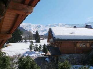 Luxury chalet in the French Alps with stunning mountain views.