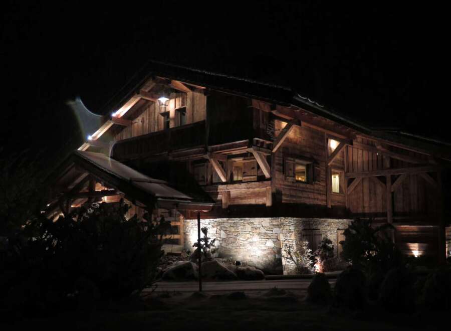 This stunning chalet boasts a unique blend of rustic charm and modern elegance.