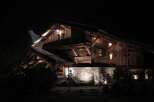 This stunning chalet boasts a unique blend of rustic charm and modern elegance.