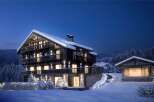 Luxury chalet in the snowy mountains with stunning night views.