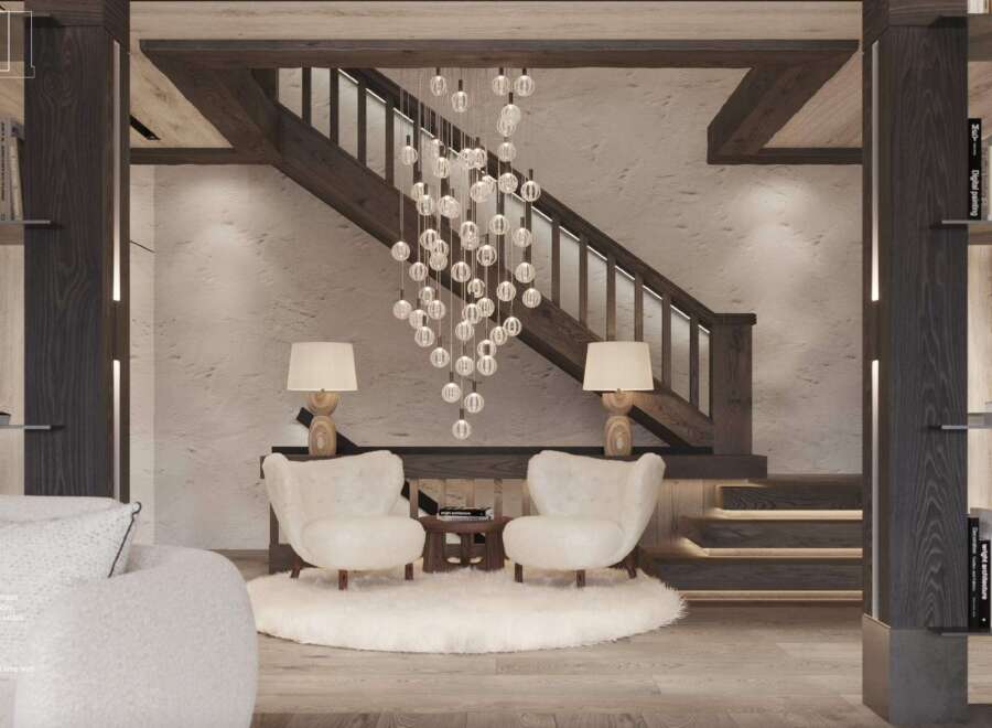 Stunning entryway with a unique chandelier, showcasing a blend of light and dark wood, and a spacious feel.