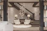 Stunning entryway with a unique chandelier, showcasing a blend of light and dark wood, and a spacious feel.