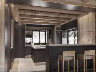 This stunning kitchen boasts a dark wood and grey stone bar, a central island, and exposed beam ceiling.
