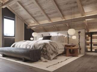 This stunning bedroom boasts an exposed wooden framework, integrated lighting, and wide-plank parquet flooring.