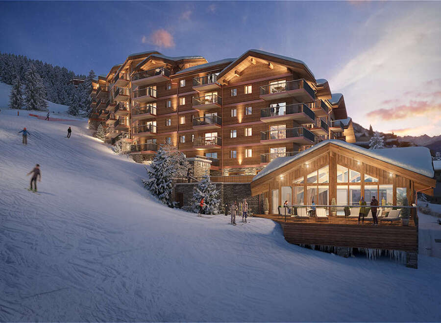 Luxury ski-in/ski-out resort nestled in the French Alps, offering stunning mountain views and direct access to slopes.
