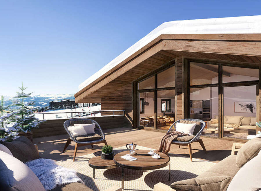 This luxurious chalet boasts a spacious balcony with breathtaking mountain views, perfect for enjoying après-ski drinks or a relaxing morning coffee.