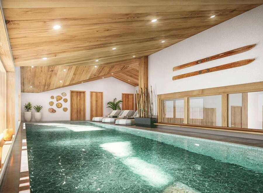 Indulge in the serene atmosphere of our indoor pool, nestled within a stunning wooden interior.
