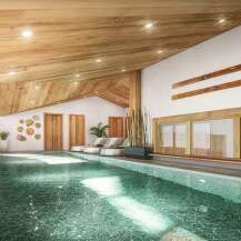 Indulge in the serene atmosphere of our indoor pool, nestled within a stunning wooden interior.