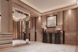 Luxury condo with stunning wood wall paneling and a mirrored elevator.