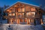 Luxury chalet in the snowy mountains with stunning views.