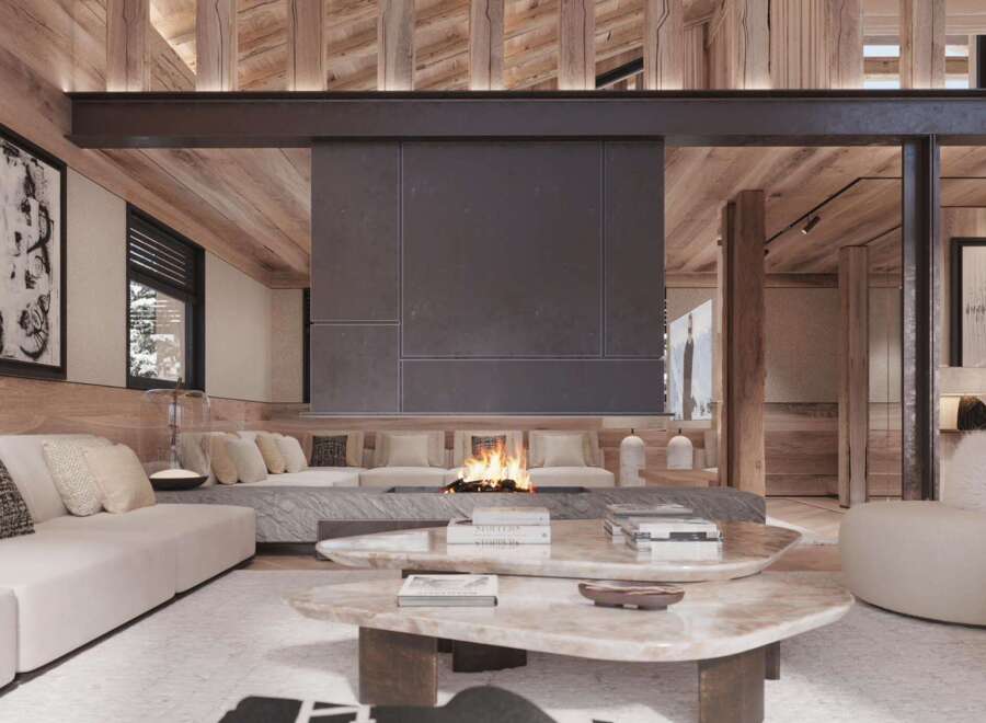 This stunning chalet boasts a spacious open-plan living area with a cozy fireplace as the focal point.