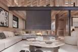 This stunning chalet boasts a spacious open-plan living area with a cozy fireplace as the focal point.