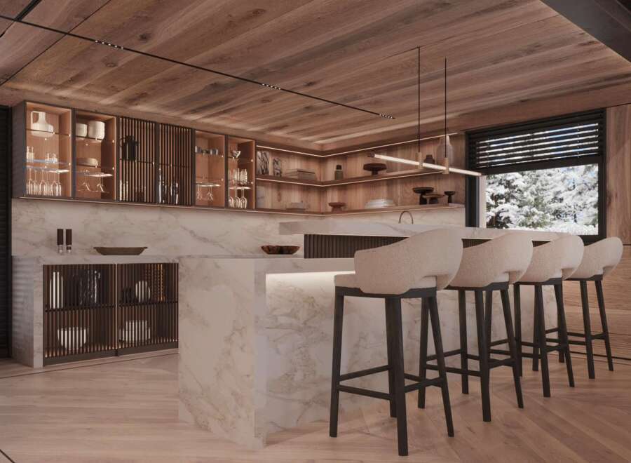 This stunning kitchen boasts a sleek marble island with built-in seating, complemented by modern bar stools and custom cabinetry.
