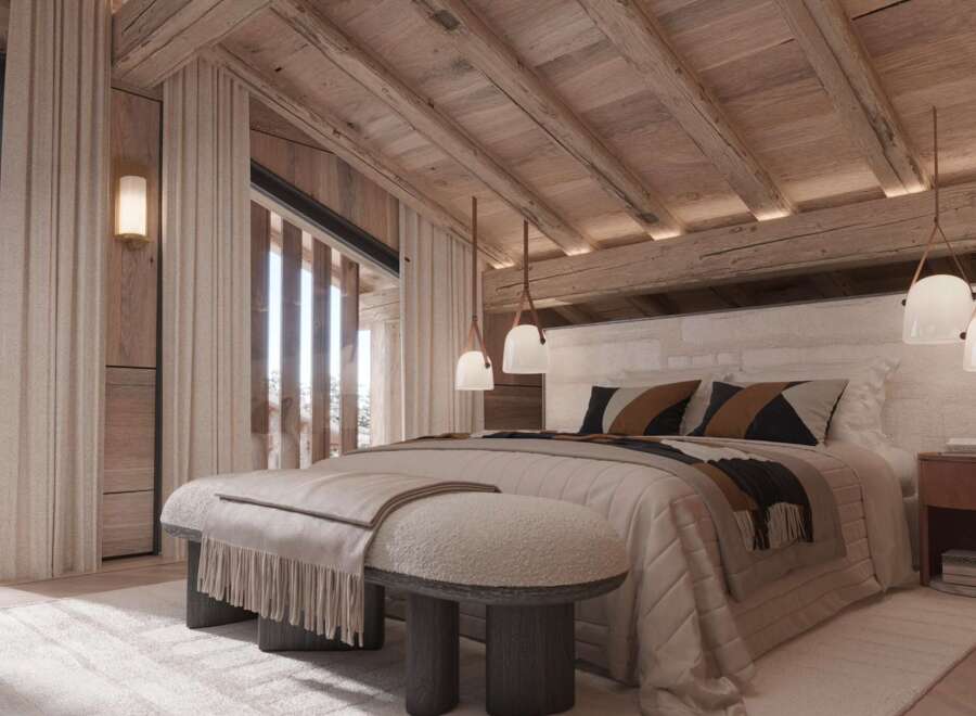 Luxurious chalet bedroom with stunning mountain views.