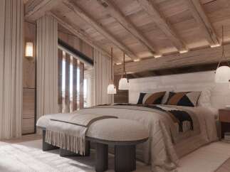 Luxurious chalet bedroom with stunning mountain views.