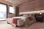 Luxury mountain chalet bedroom with stunning views.