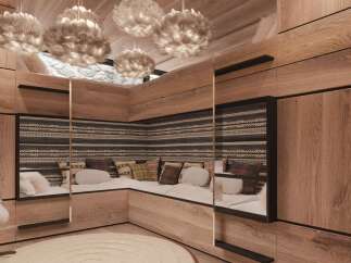 Cozy kids' room with built-in corner seating and custom wood paneling.