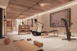 Luxury home gym with state-of-the-art equipment, including treadmills, stationary bikes, and weight sets.
