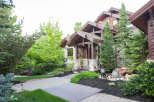 This stunning property boasts a beautiful stone facade and a welcoming entrance.