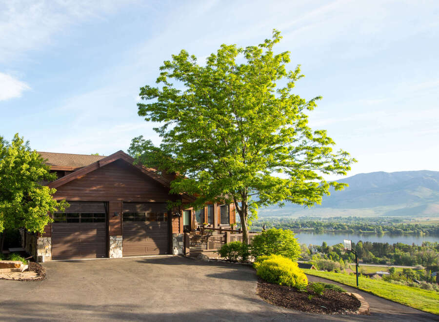 Stunning waterfront property with a beautiful wooden house.