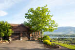 Stunning waterfront property with a beautiful wooden house.