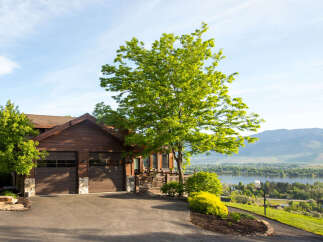 Stunning waterfront property with a beautiful wooden house.