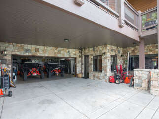 This stunning property boasts a spacious garage, perfect for storing vehicles and equipment.