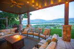 Enjoy the stunning views from this outdoor patio, complete with a cozy fire pit and comfortable seating.