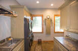 This laundry room boasts a stylish and functional design.