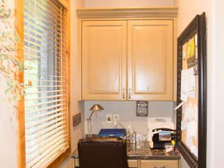This cozy home office nook offers a perfect blend of functionality and style.