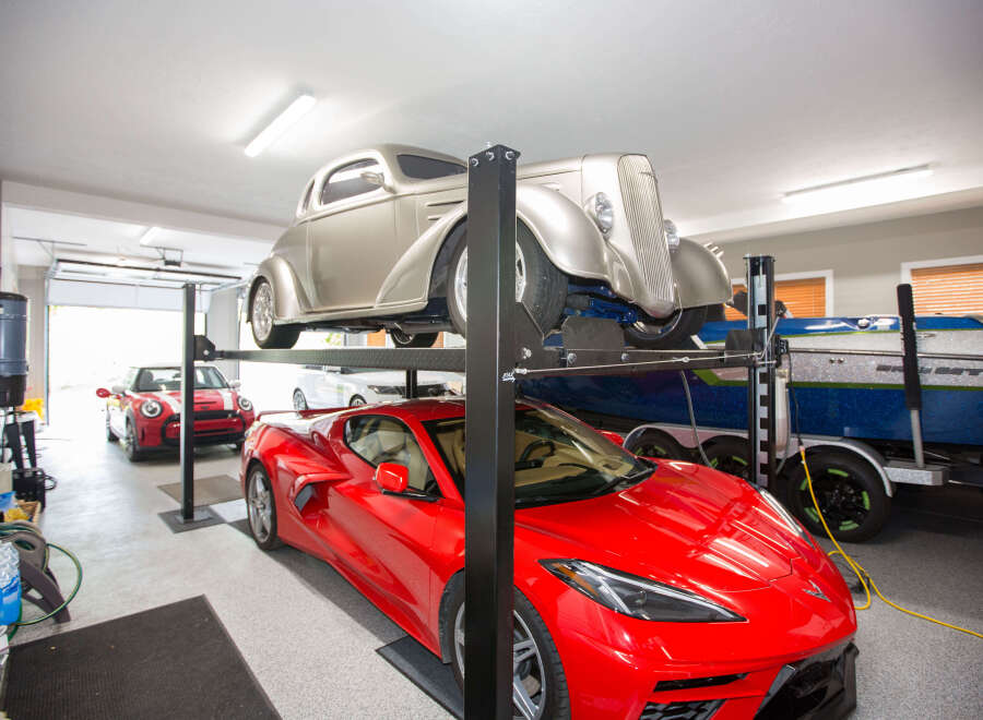 This stunning property boasts a multi-car garage, perfect for car enthusiasts.