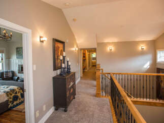 This stunning property boasts a beautifully designed hallway, perfect for showcasing artwork and decor.
