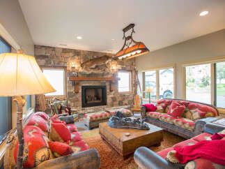 Step into rustic elegance in this stunning living room.
