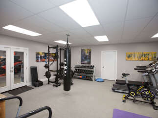 This home gym is the perfect space to achieve your fitness goals.