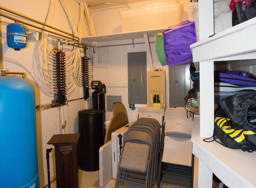 This basement storage area offers ample space for organization.