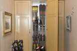 This entryway features a custom ski storage cabinet, perfect for keeping gear organized.
